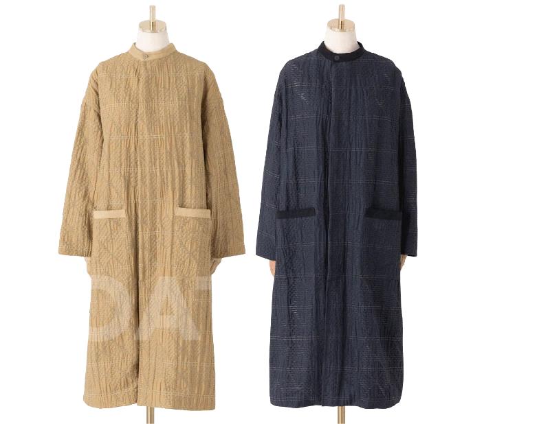 すっきり - ラインシルエットのコート。ジャガード生地の風合いがポイントに。